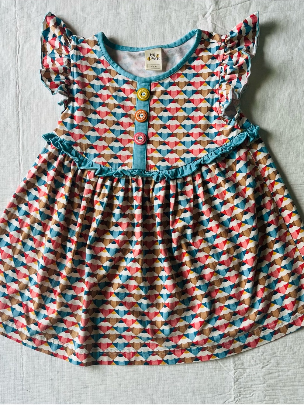 Wildflowers Pencil Me In Ella peplum tunic top, blue, teal, pink, red, brown